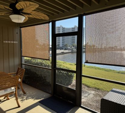 Screened patio with retractable blinds